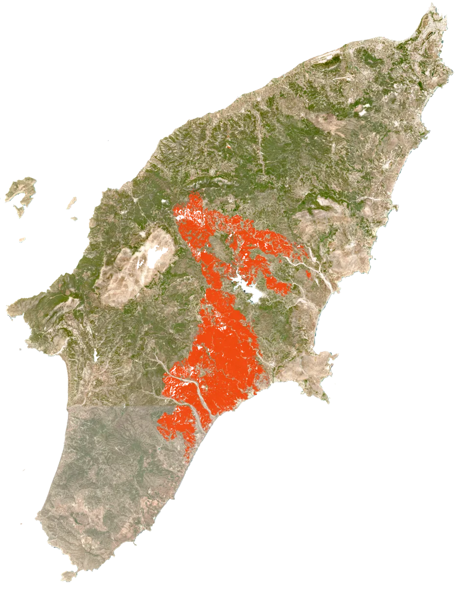 Satellite imagery with an orange-red burn overlay across the central and southern portion of an island.
